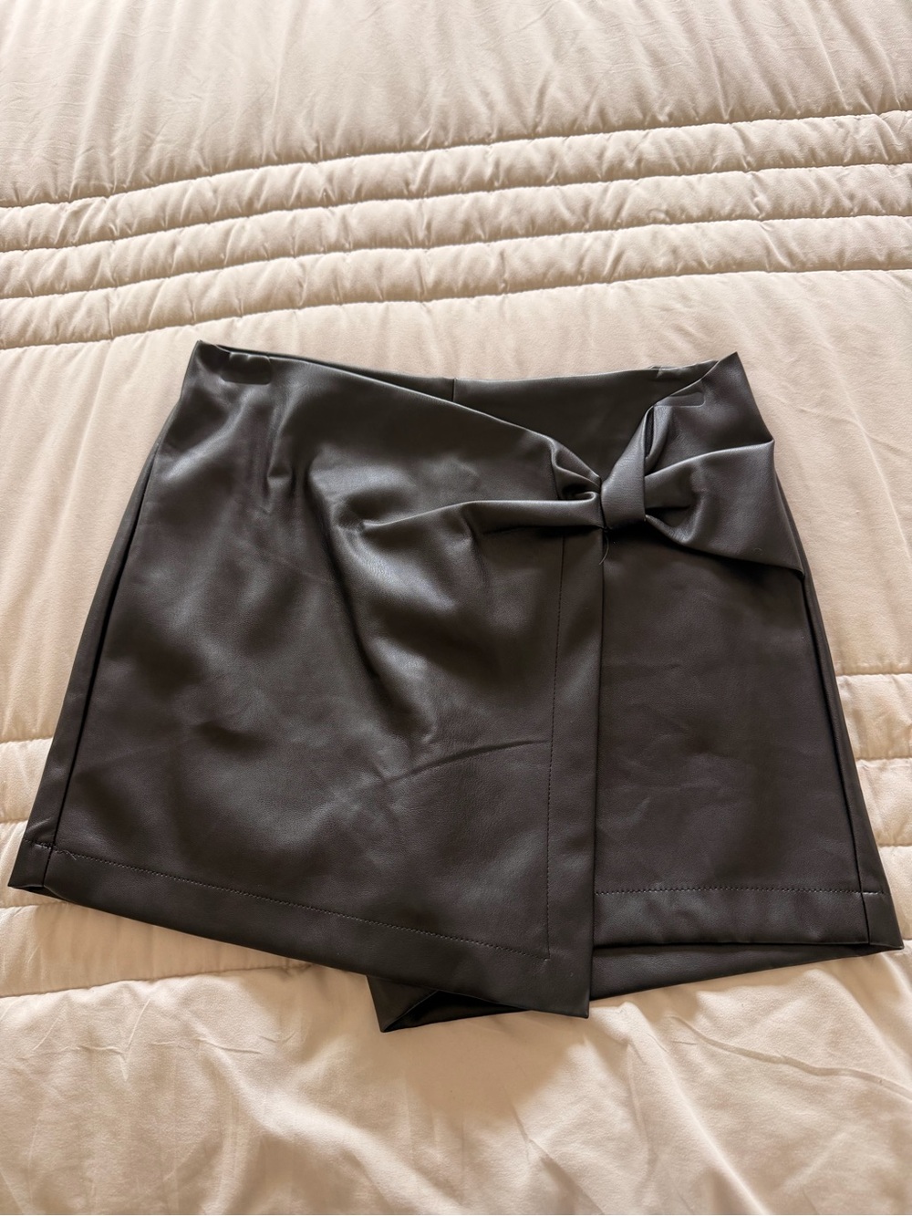 Francesca's Collections Black Faux Leather Wrap Mini with Bow